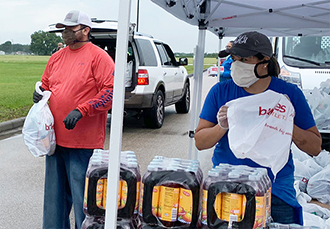 Workers give out food